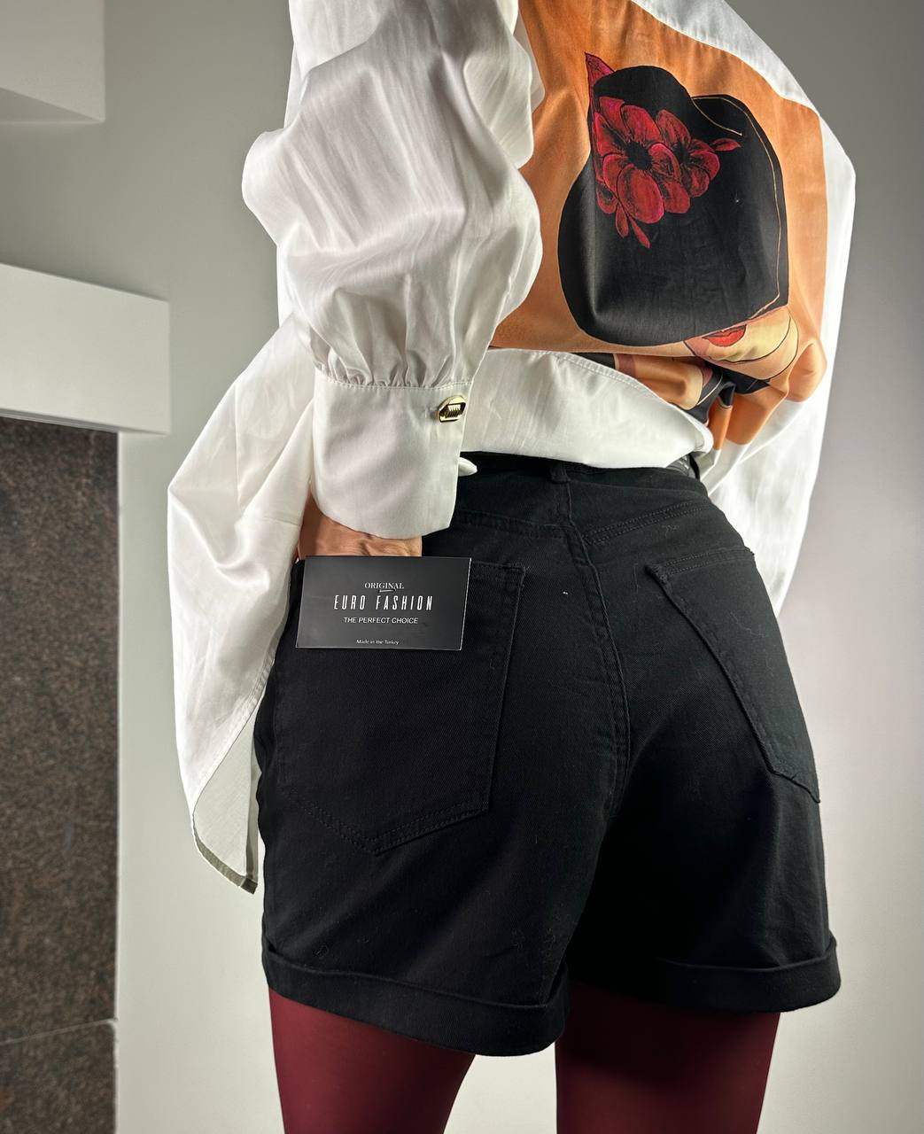Black denim shorts